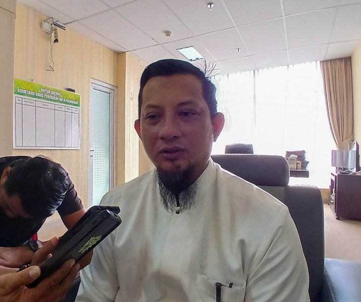 Plt Kepala Disdik Pekanbaru Syafrian Tommy. Foto: Surya/Riau1.