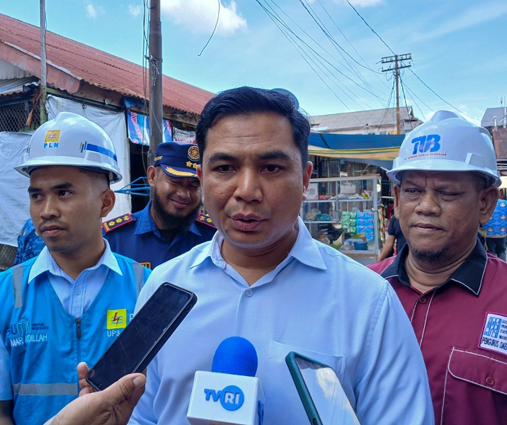 Plh Asisten II Bidang Perekonomian dan Pembangunan Setdako Pekanbaru Zulhelmi Arifin. Foto: Surya/Riau1.